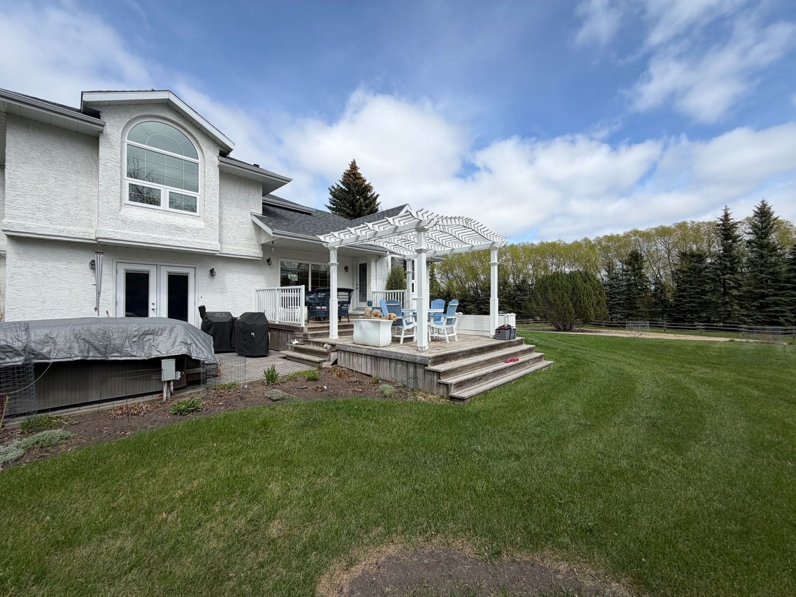 Before, Two-Tier Composite Deck Resurface with Lit Stairs in Parkland Beach, AB, by Green Ladder Contractors