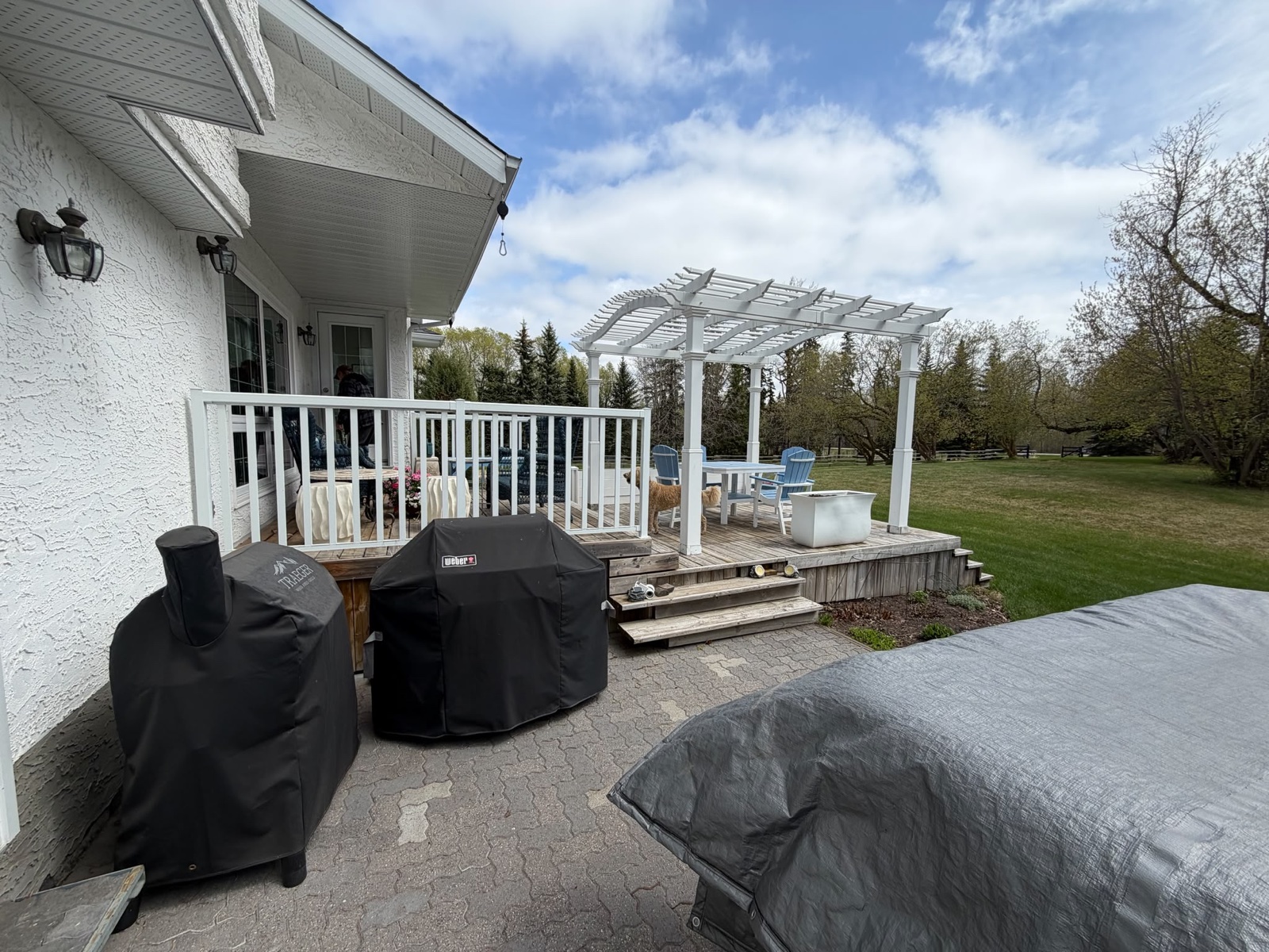 Before, The hot tub side in Parkland Beach, AB, by Green Ladder Contractors