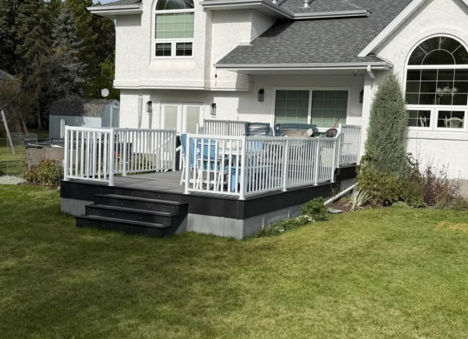After, From the side yard in Parkland Beach, AB, by Green Ladder Contractors