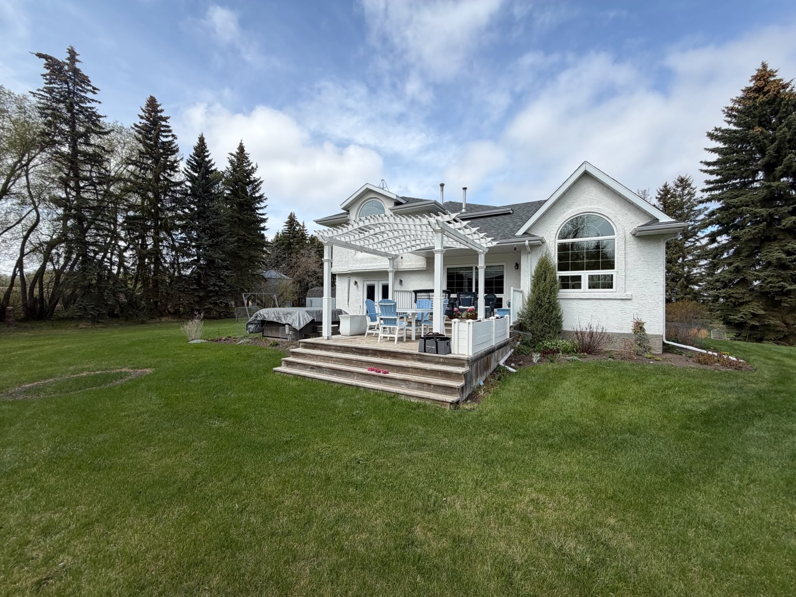 Before, From the back of the yard in Parkland Beach, AB, by Green Ladder Contractors